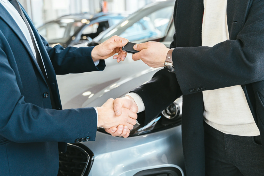 Lender shaking hands with client who got approved for auto financing Australia